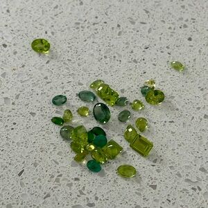 Lot of 30 beautiful heat treated green gemstones